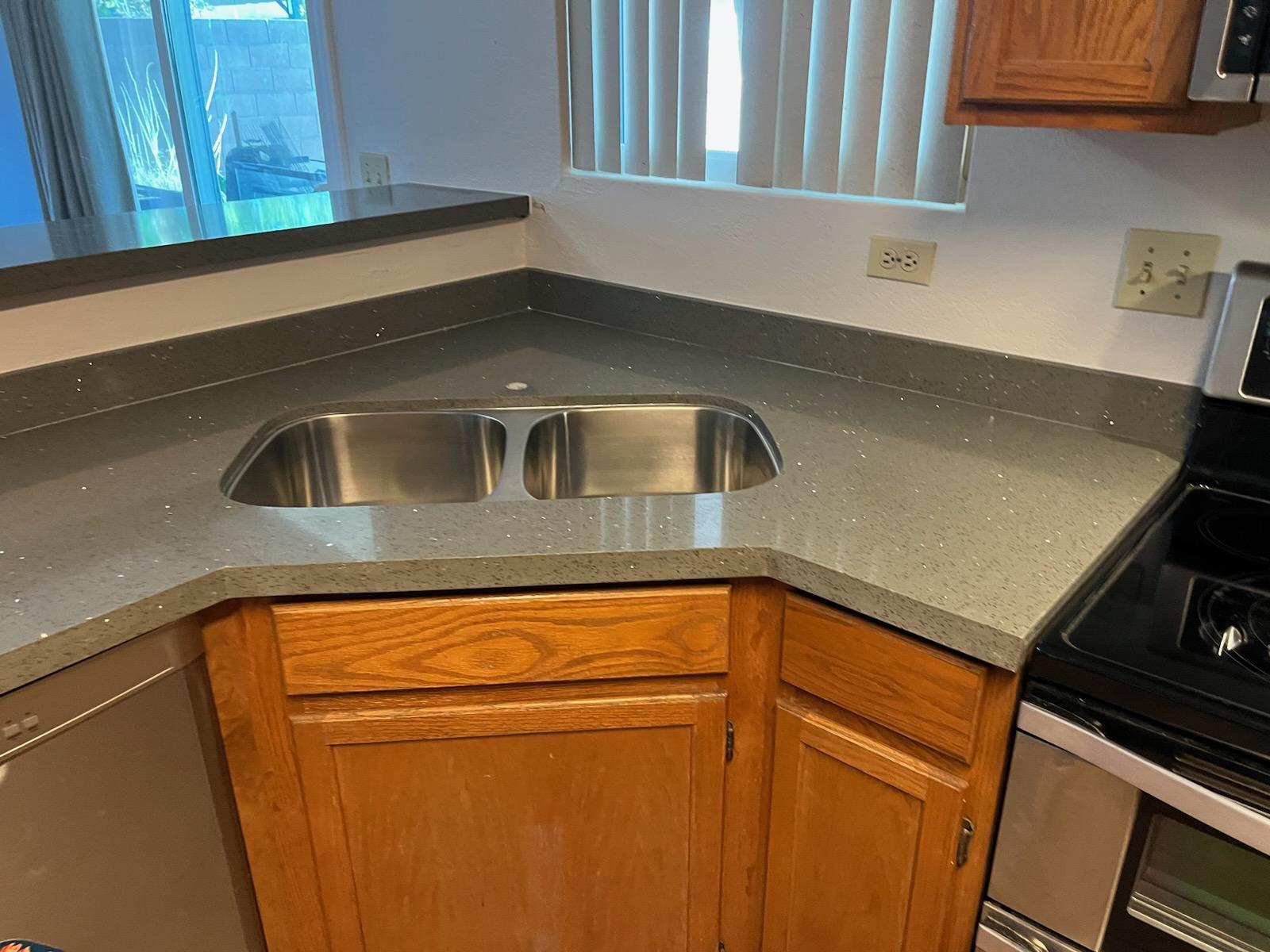 kitchen sink with gray quartz